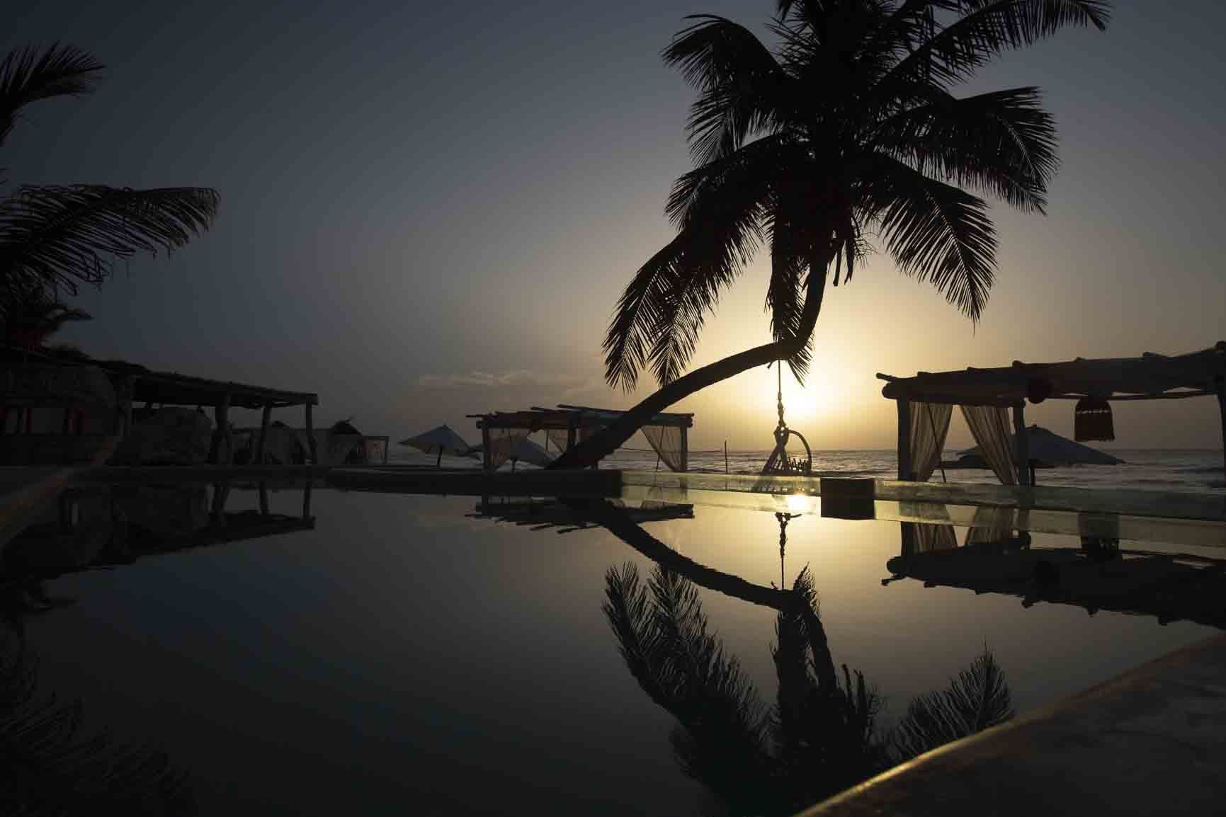 Beach club pool at sunset